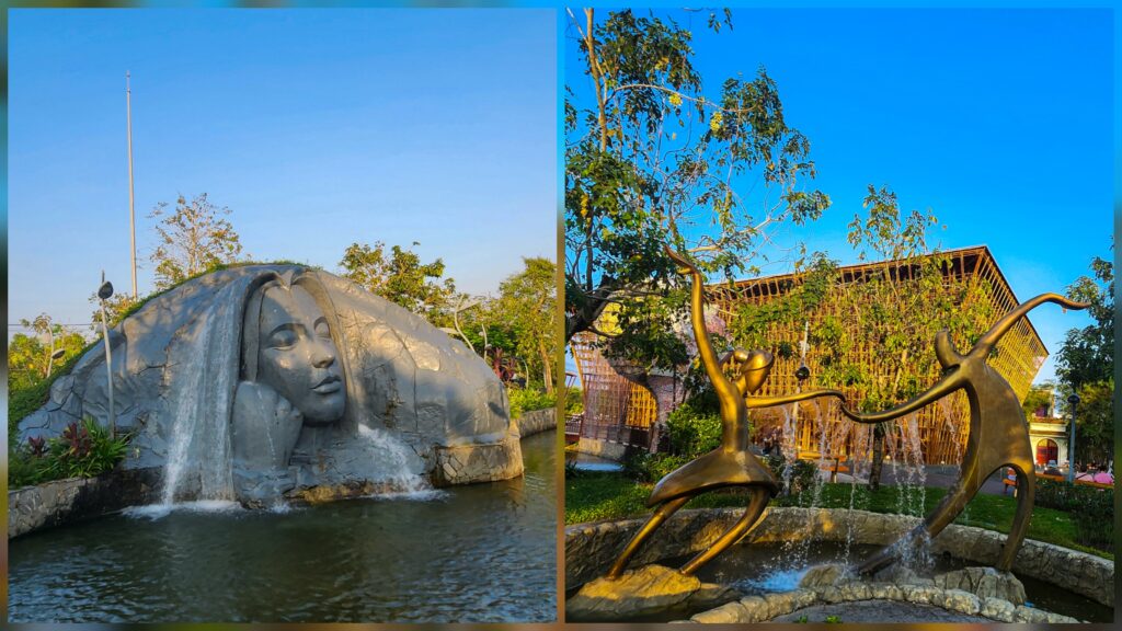 Urban Park Grand World Phu Quoc walking path with trees and sculptures