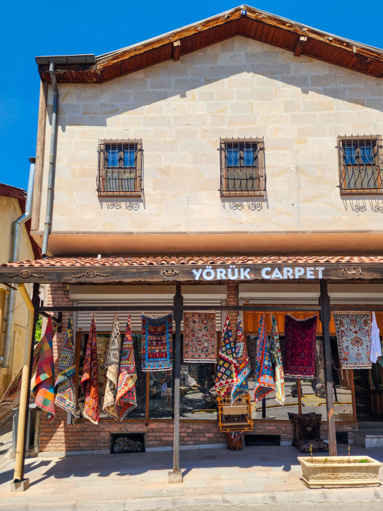 Historic stone building with a carpet shop in Avanos