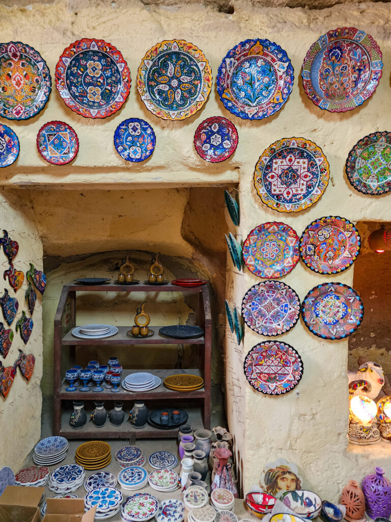 Painted ceramic plates displayed around a doorway in Avanos