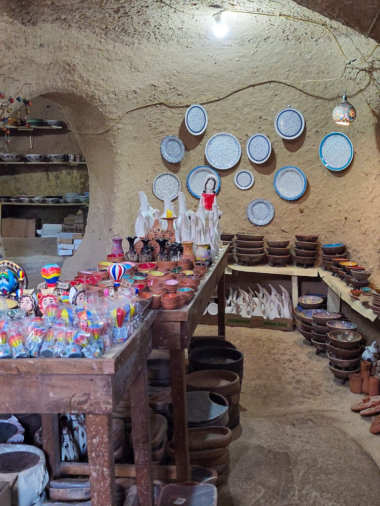 Ceramic plates displayed inside a pottery workshop in Avanos