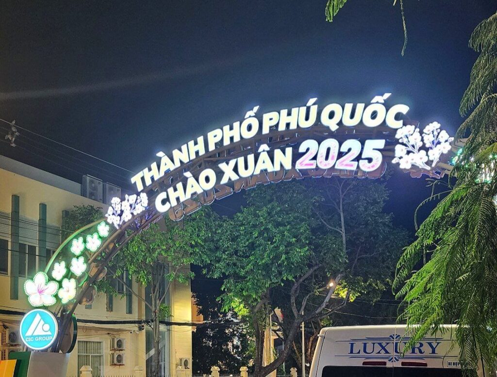 Phu Quoc visa guide: illuminated Phu Quoc City welcome arch over a street in Duong Dong