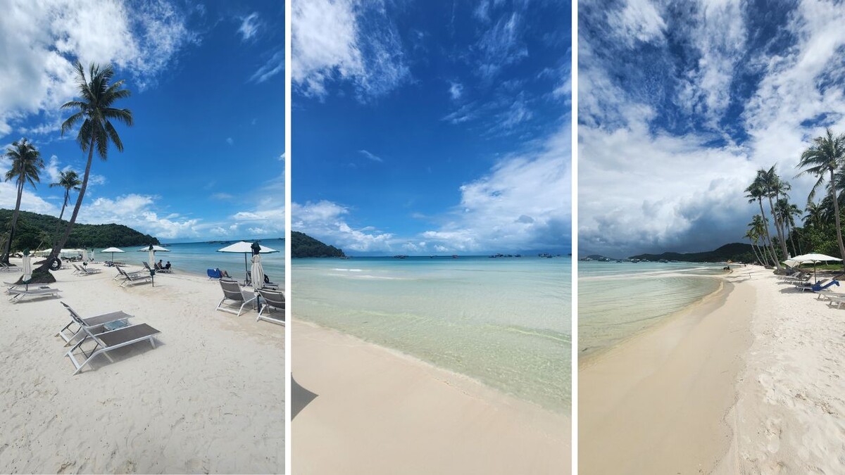 Beach chairs, clear turquoise shallows, and white sand at the Paradiso section of Bai Sao beach, Phu Quoc
