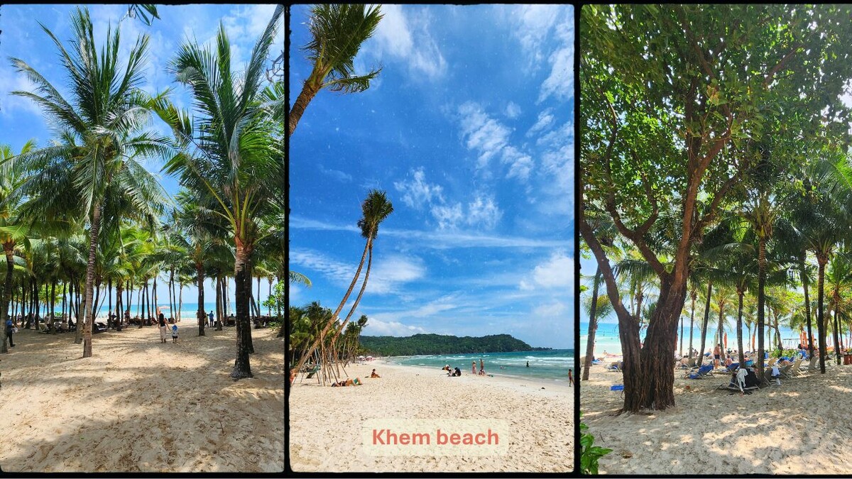 Palm trees, white sand, and sunbeds at Khem Beach near Sunset Town, Phu Quoc