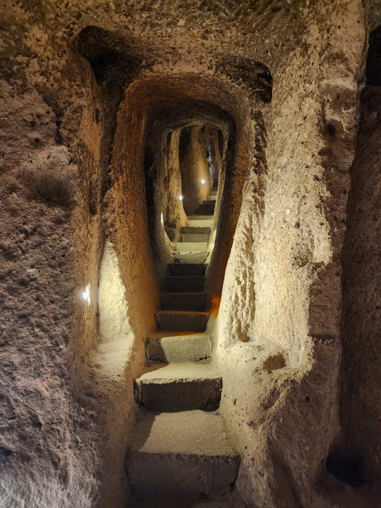 Derinkuyu Underground City narrow stone tunnel descending underground