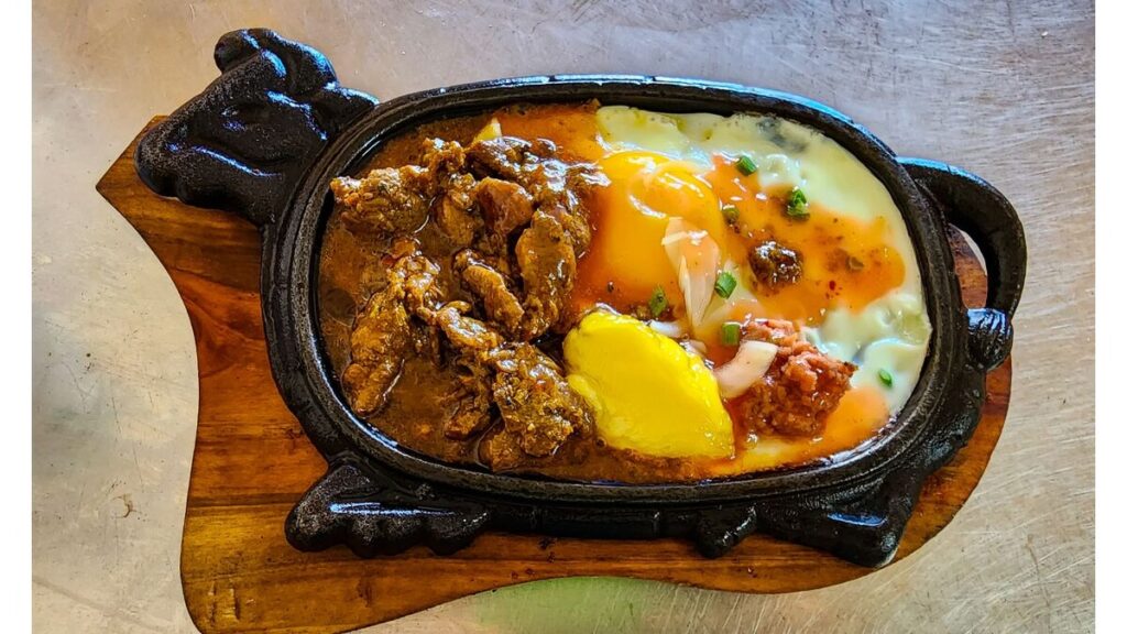 Bò Né Vietnam: Sizzling Beef, Eggs & How to Eat It