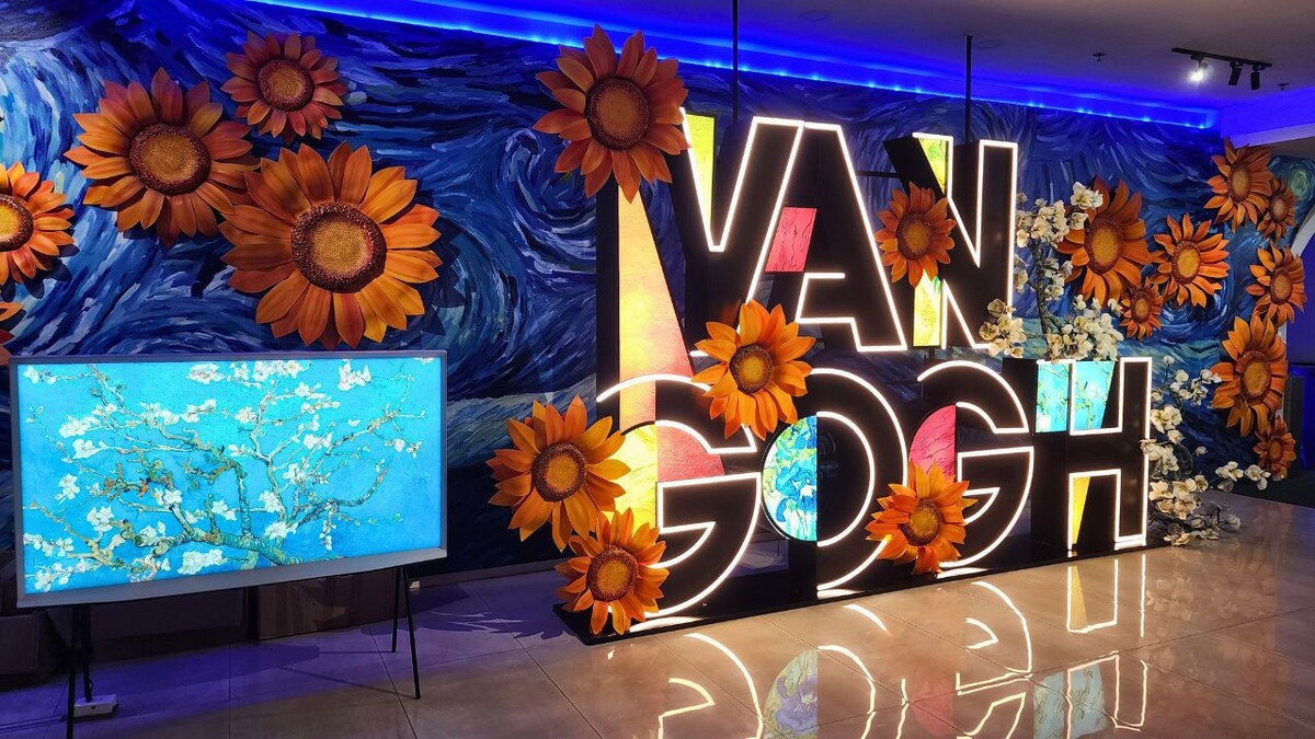 Van Gogh exhibition entrance display with sunflower decorations at Gigamall