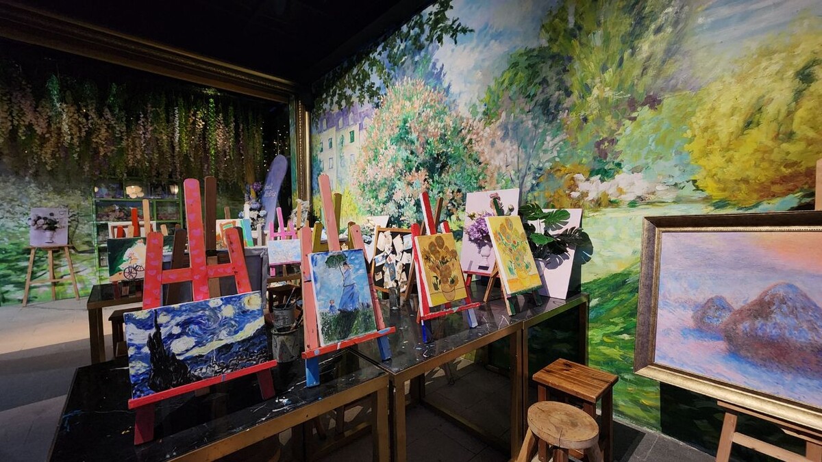 Colourful art-inspired interior with seating at the Monet and Van Gogh exhibition
