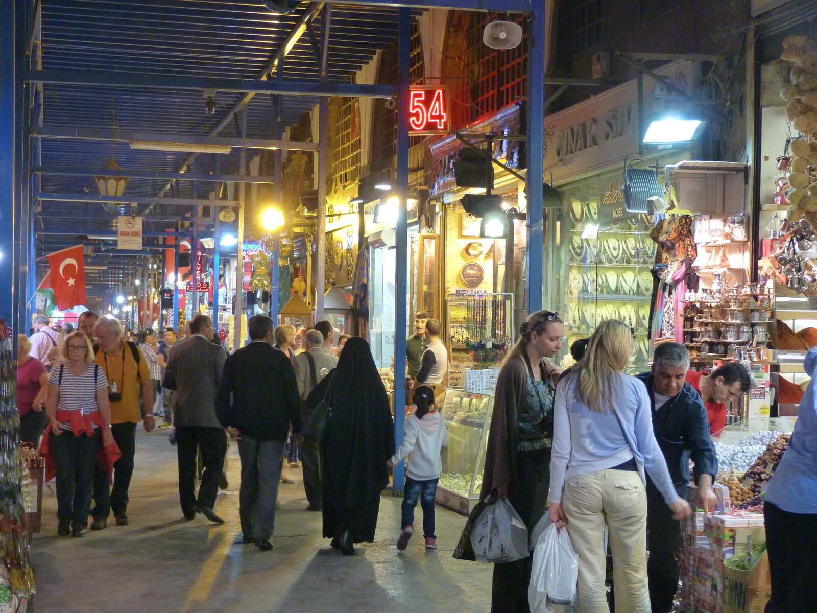 Shopfronts and shoppers inside Istanbul's Spice Bazaar