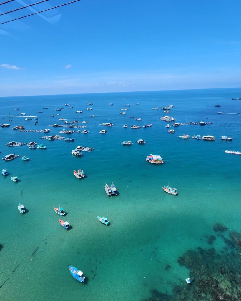 Boats moored over clear turquoise water off An Thoi, Phu Quoc